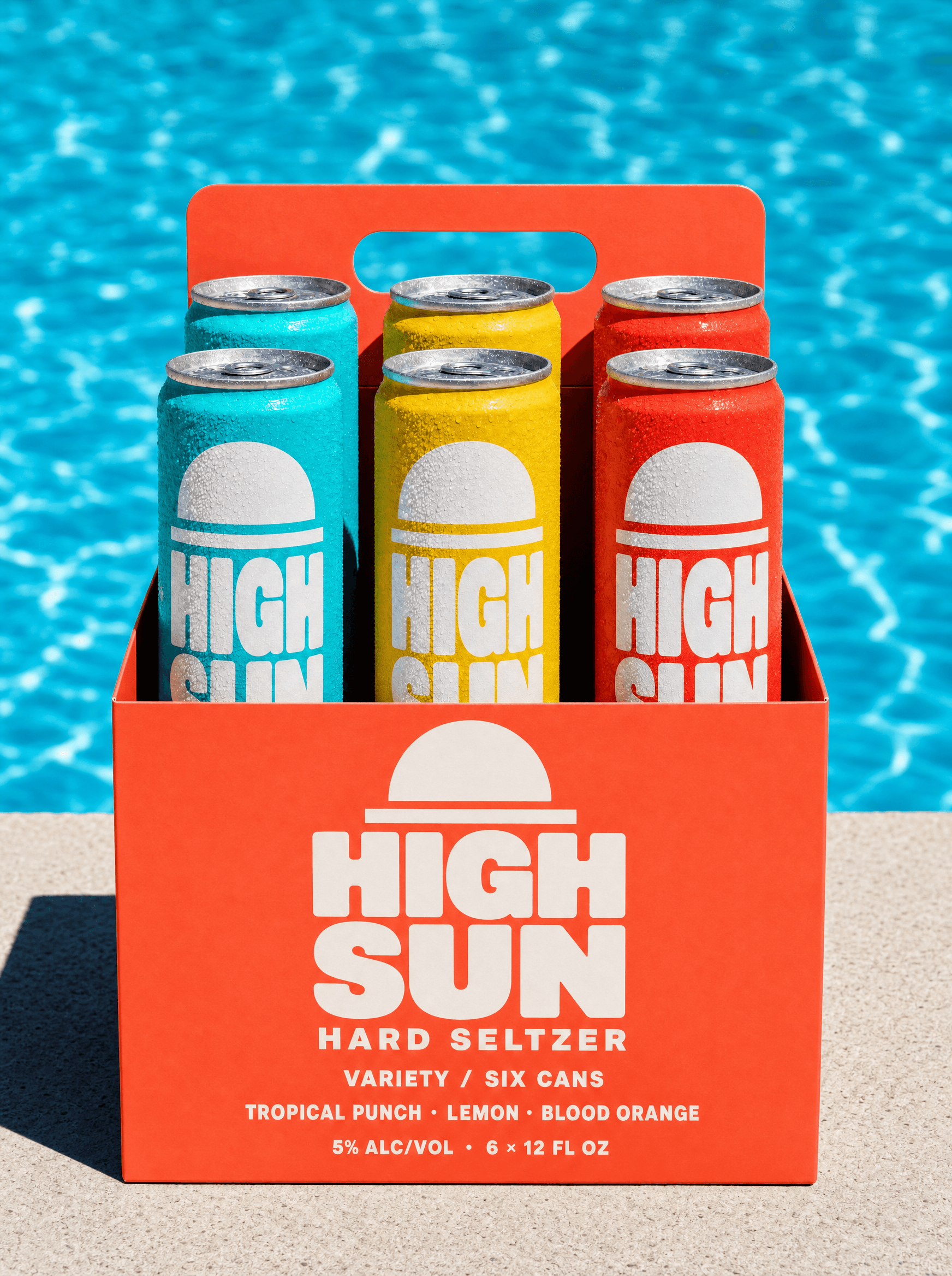 High Sun hard seltzer variety six-pack carrier on hot poolside concrete