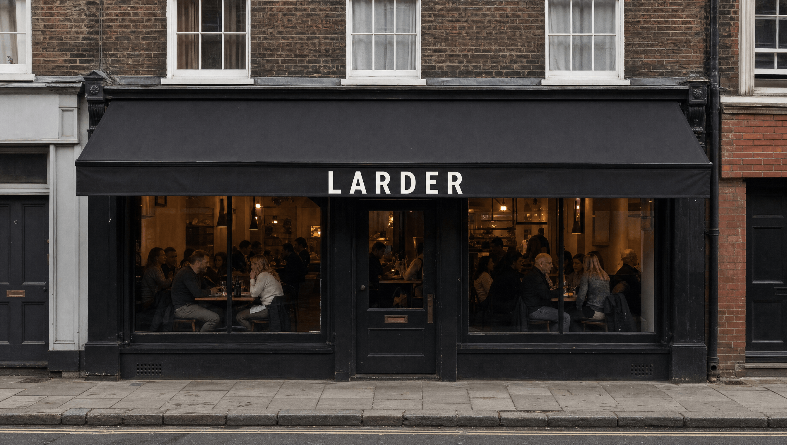 Larder shopfront in ink, wordmark painted on the awning, room full at dinner