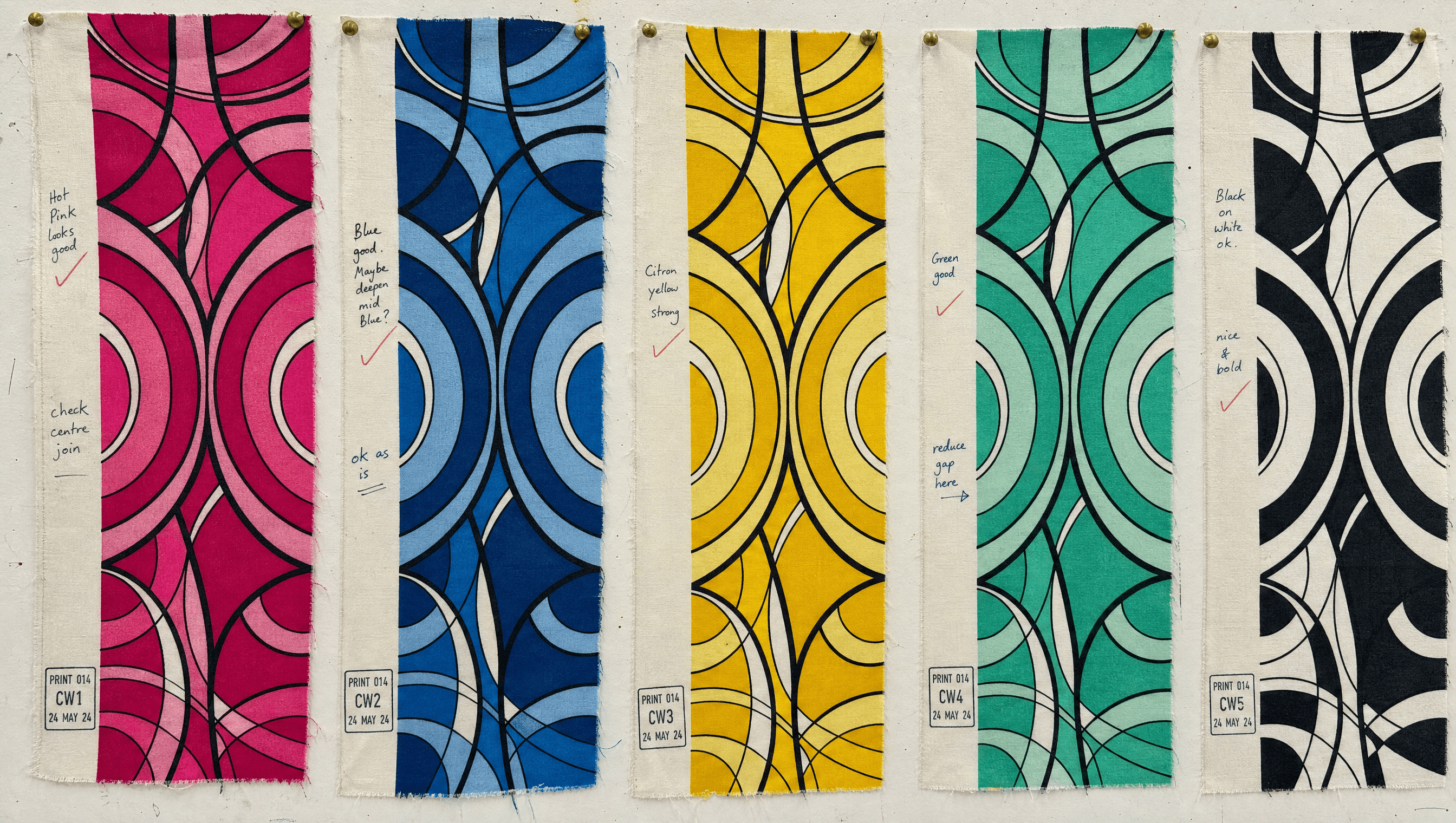 Ponza strike-off card wall showing one print in five colourways, hand-annotated and stamped