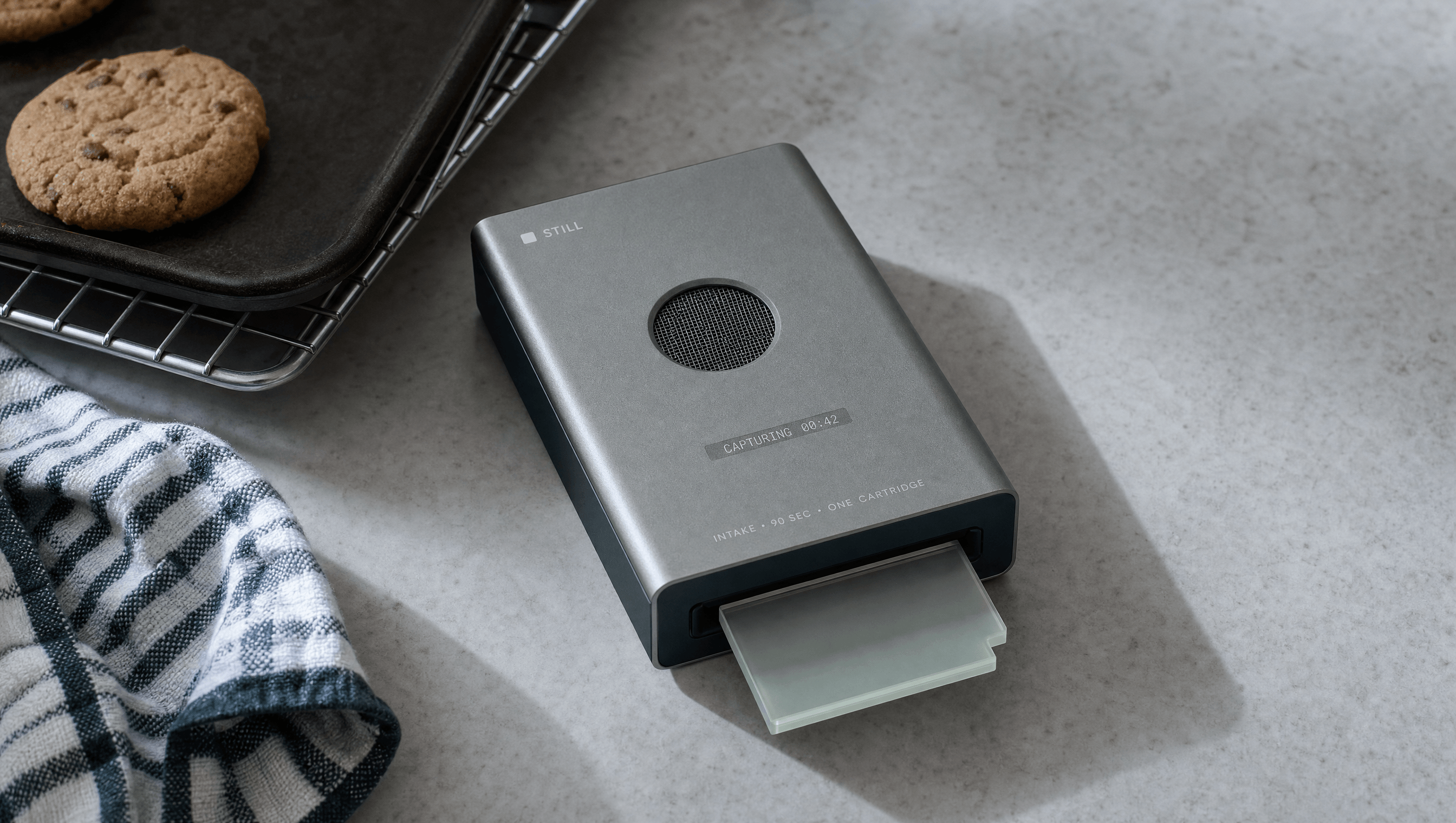 Still capture device on a kitchen worktop mid-capture